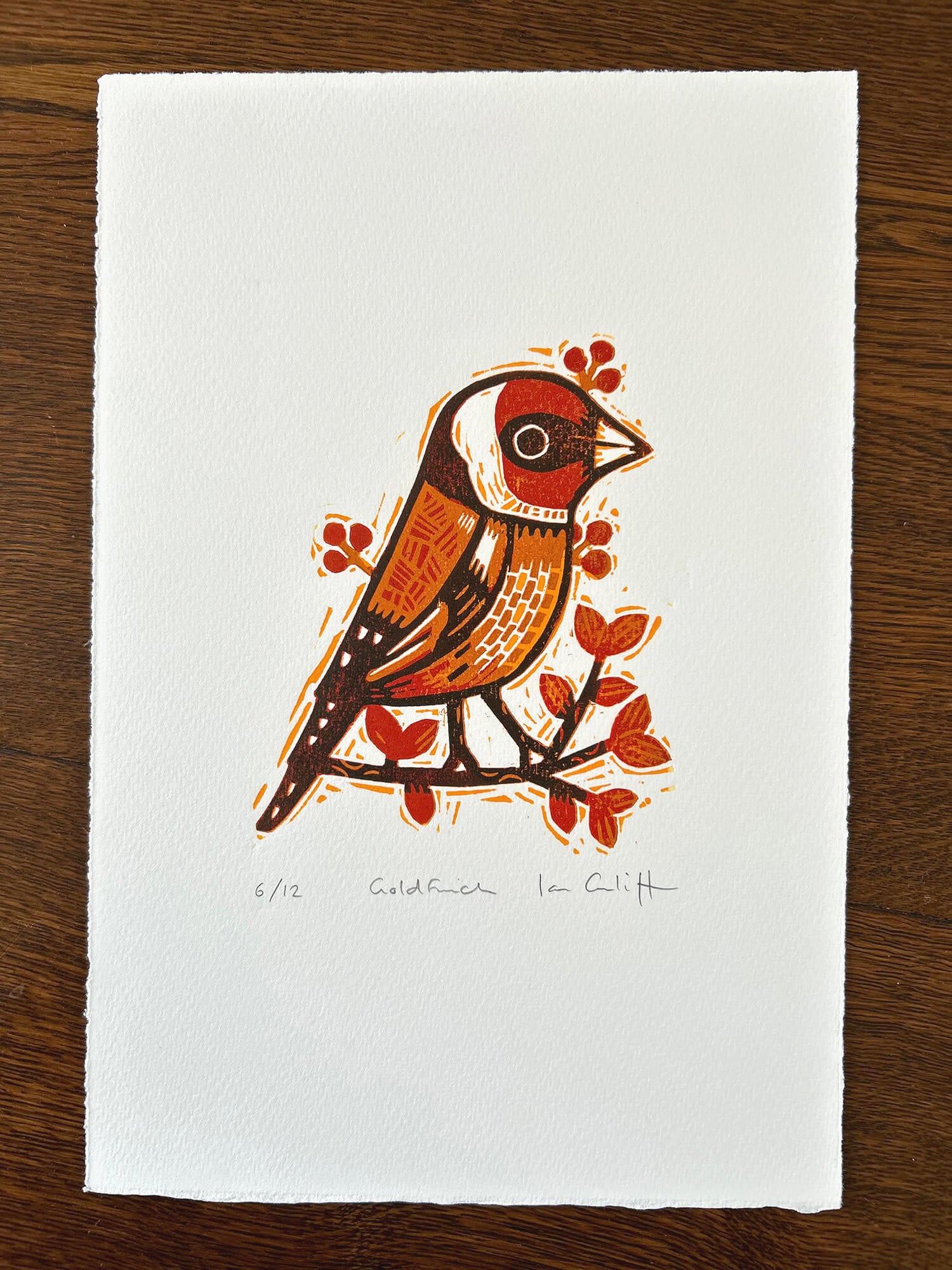 Print of a stylized bird with floral elements on a white background