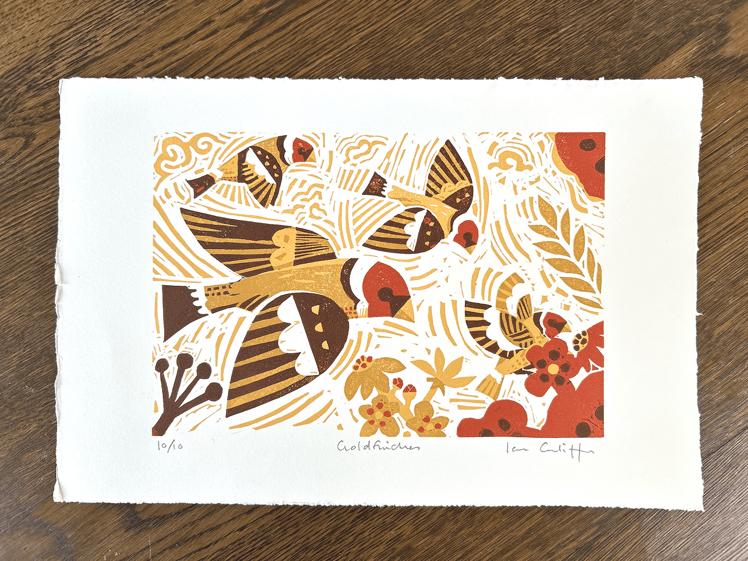 Goldfinches linocut print on archival Somerset paper showing rich colour layers and hand-carved texture