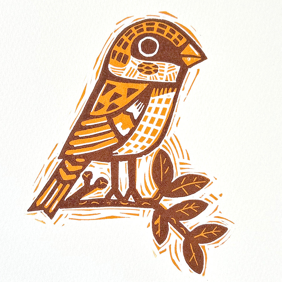 Sparrow on leafy branch, hand-carved two-colour linocut print with warm orange and brown tones