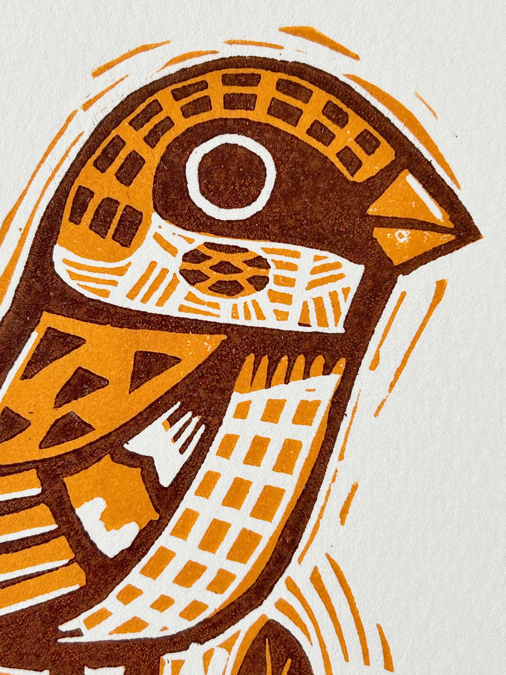 Sparrow linocut detail showing hand-carved linework and natural textures