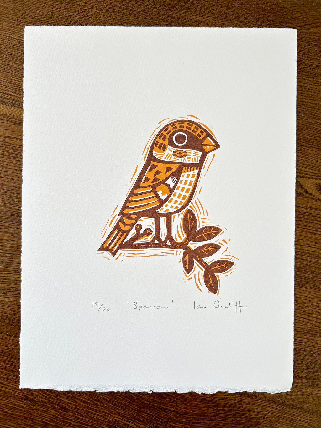 Sparrow linocut detail showing hand-carved texture and bold relief printing technique